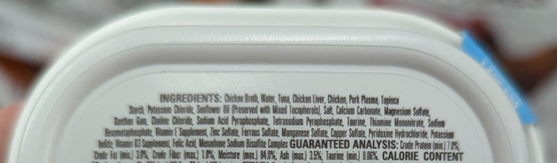 Pet Food label listing ingredients and guaranteed analysis results, including moisture and ash